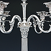 Central intersection of all five branches of the antique silver candelabra
