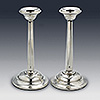 Pair of sterling silver candlesticks by Edwardian Reynolds and Westwood 