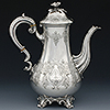 Left side profile of sterling silver Victorian coffee pot with engraved cartouche