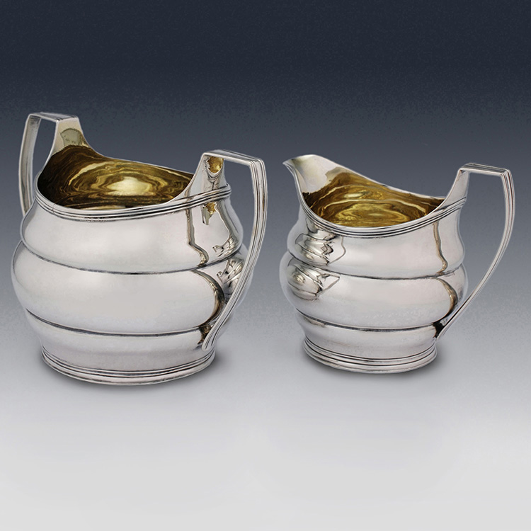 Georgian silver cream jug and sugar bowl set