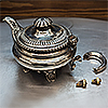 teapot with broken ivory insulators